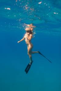 Sportive Young Surfer Girls On A Trip Around Nude Underwater-o7msmxfst2.jpg