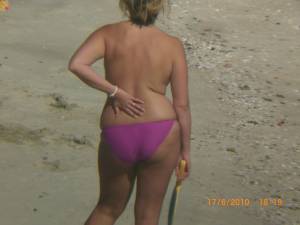 Playing Topless On The Beach-77n1f92sxk.jpg