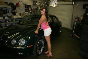 Busty brunette posing in a garage (88 Pics)-y7n9la0tz6.jpg