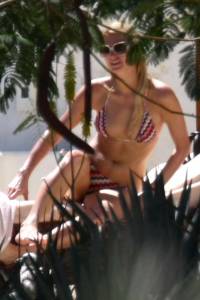 Paris Hilton â€“ Topless Sunbathing in Mexico (NSFW) (MQ)k7nkkx8tr2.jpg