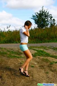 Teen girl peeing in the village-p7nl304bfv.jpg