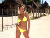 Crissy Moran - Yellow bikini at the beach-a7od0psfpc.jpg