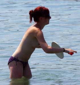Slim Redhead Topless on the Beachl7od366anh.jpg