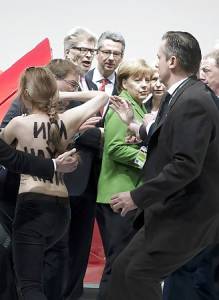 Putin meets Femen activists in Hannover -h7og2nfrw1.jpg