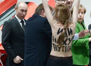 Putin-meets-Femen-activists-in-Hannover--j7og2mr4ce.jpg