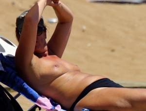 MILF-on-the-Beach-showing-her-tits-n7qabnnbds.jpg