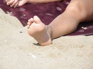 Greek-Bikini-Beach-Girl-Making-The-Peace-Sign-With-Her-Body-m7qbpe44ch.jpg