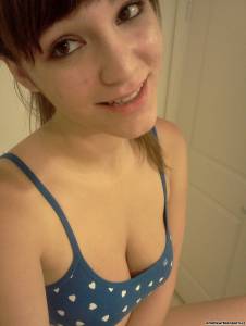 Hot-brunette-female-taking-selfies-of-her-nice-melons-d7qeail6im.jpg