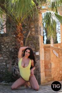 YELLOW SWIMSUIT TEASE - KYM GRAHAM GETS NAKED UNDER THE PALMS-y7q9jerdgp.jpg