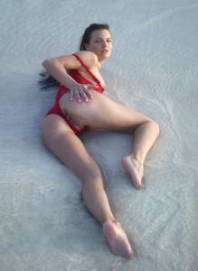 2009-11-14 - Suzie Carina - Red Bathing Suit-m7qr9uoovu.jpg