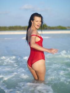 2009-11-14 - Suzie Carina - Red Bathing Suit-v7qr9t2u6o.jpg